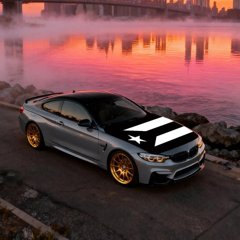 Car with Puerto Rico black and white flag hood cover beside a lake at sunset, ultra stretchy polyester spandex. Universal fit for cars.