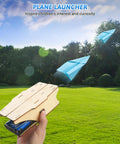 Child launching paper planes with wooden STEM plane launcher in a park, part of Hands On STEM Kit For Kids Ages Eight To Thirteen Five Wooden 3D Puzzles And Educational Science Experiment Building Projects Crafts Toys For Boys And Girls Perfect Birthday Gift And Learning Toys kit.