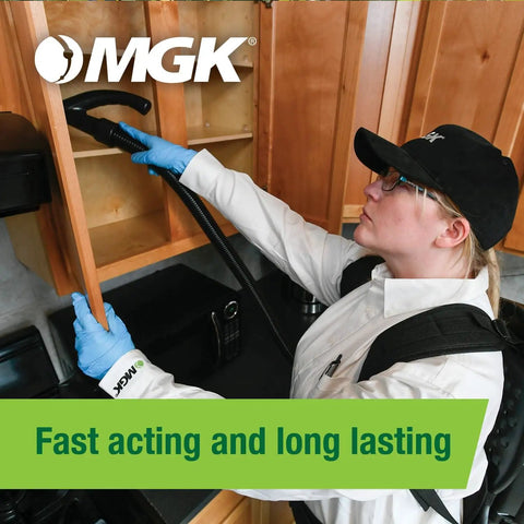 Technician using pest control equipment under kitchen cabinets, emphasizing fast acting and long lasting results.