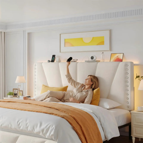 Queen Bed Frame With Smart Led Lights And Dual Usb Ports App Remote Music Sync And Custom Timer For A Lowkey Dreamy Bedroom Setup Solid Noise Free Platform In Cozy Beige with a woman relaxing against a velvet headboard.