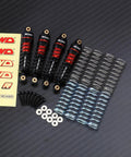 ARRMA Grom Shock Absorber Kit With 3 Spring Options including gray and silver springs, washers, and stickers on black background.