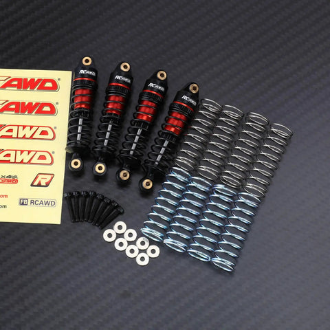 ARRMA Grom Shock Absorber Kit With 3 Spring Options including gray and silver springs, washers, and stickers on black background.