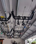 Garage door storage rack for fishing gear 21 inch black ABS rod holder allows saltwater tackle organization without tools.