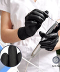 Person wearing Disposable Nitrile Gloves Black Latex Free Powder Free Non Sterile 100 Count Box Medium for precision work