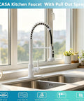 GICASA Kitchen Faucet - Pull Down Sprayer, High arc Commercial Stainless Steel Kitchen Sink Faucet White beside window.