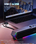 G11 Desktop Computer Speakers With Touch Lights, Immersive Surge Stereo Sound, USB C and USB powered next to a laptop