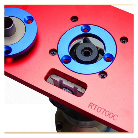 Heavy Duty Aluminum Router Table Insert Plate With Fast Align Center Bushing For Woodwork Stations close-up of red plate with blue center bushing.