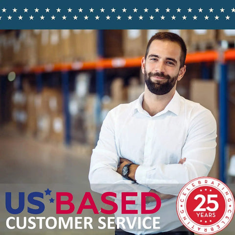 Smiling man in warehouse with US-based customer service banner, showcasing 25 years of service, wearing a white shirt.