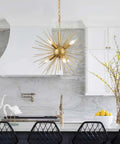 Gold Sputnik Chandelier With Six Lights, Vintage Geometric Pendant Fixture in a kitchen setting above an island.
