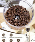 Close-up of Electric Coffee Bean Grinder 250G For Commercial And Home Use 200W Automatic Burr Grinder With Eight Grind Settings From Fine To Coarse See Through Hopper Barista Quality Fresh Grounds White, showing see-through hopper with coffee beans.