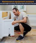 Man using Labor-Saving Arm Jack Two-Piece Set for cabinet installation, lifting cabinet door, DIY home project setup.