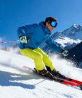 Skier wearing Men's Pro Ski Jacket With 15K Waterproof And 10K Breathable Fabric, Insulated Snowboard Coat in blue, Large size