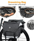 Rear Rack Panniers With 25 To 35 Liter Expandable Capacity Water Resistant Cycling Luggage For Ebike Commuters Dual Compartments With Secure Drawstrings Top Zip Pockets Tool Straps And Reflective Trims For Groceries, showing open compartments with shoes and tools inside, attached to bike rack.