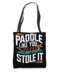 Black tote bag with 'Paddle Like You Stole It' graphic featuring dragon boat. Dragon Boat Racing Paddler Tote Bag For Dragonboating Fans And Team Members Unisex Gear To Carry Paddles And Gear During Regattas Festivals And Synchronous Paddling Sessions. Polyester fabric with dual straps.