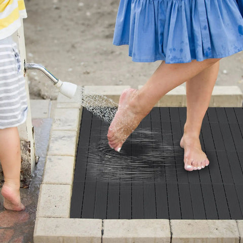 Interlocking Plastic Deck Tiles 36 Sq Ft Pack 36 12 by 12 Inches Waterproof Outdoor Flooring for Porch Poolside Balcony Backyard Pathway All Weather Charcoal Gray DIY Friendly Easy Install Durable Lightweight - feet rinsing on charcoal gray tiles