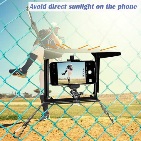 Fence Mount With Sun Shield For Phones And Action Cameras Secure Phone Holder Kit capturing baseball game on fence.