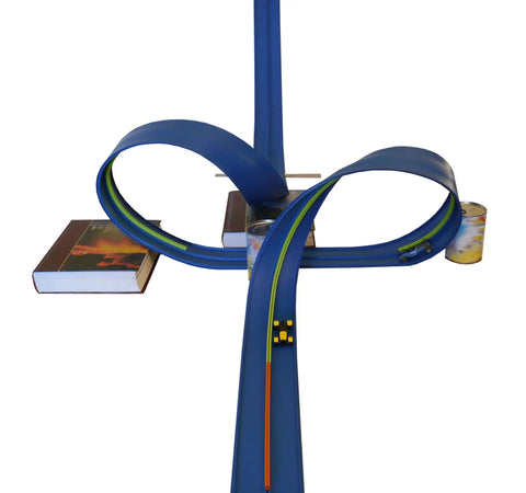 Two Lane 18-Foot Race Track Stunt Set with ramps, loops, and hangers for high-speed action-packed car racing fun setup with books and cans