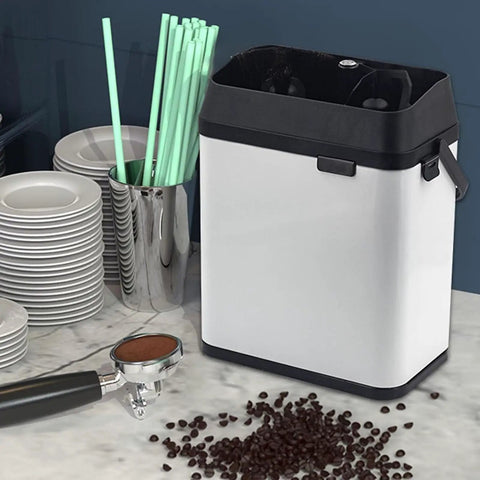Automatic Electric Coffee Handle Cleaner And Knock Box For Busy Baristas Quick Portafilter Ground Shaker 150 Watt Motor on countertop.