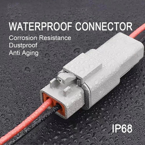 Close-up of 2 Pin Waterproof Automotive Connector With 12 AWG Cable Wire on wet surface, highlighting corrosion resistance and durability.