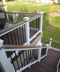 101 Pack 26 Inch Hollow Aluminum Deck Balusters For Railing And Fencing installed on stairs and deck with wood finish