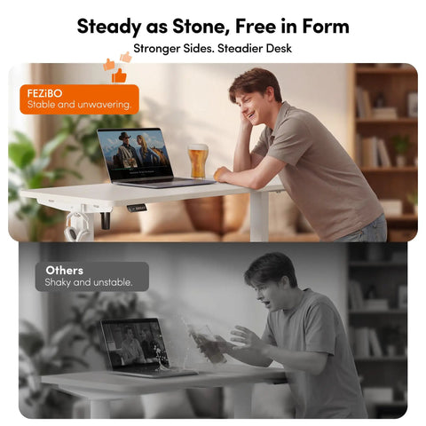 Person using 32 Inch Electric Standing Desk With Adjustable Height From Sitting To Standing, showcasing stability with laptop.