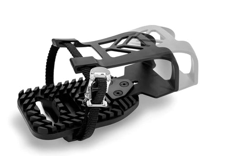 Close-up of toe cage adapters for Look Delta pedals with straps on Peloton bikes for sneaker use indoors.