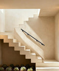 Heavy Duty Stainless Steel Flush Wall Mount Stair Railing supports 200 lbs installed on concrete stairs for secure grip.