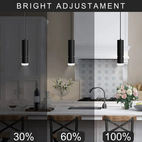 Dope Adjustable Focus Pendant Lights For Kitchen Island And Dining Room on dimming settings above a white kitchen island.
