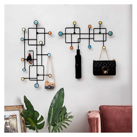 Heavy-Duty Wrought Iron Shell Wall Hooks, Double Robe And Coat Rack For Closets Bathrooms And Entryways, Game-Saving Space Organizer for bags, hats, and jackets on a stylish wall.