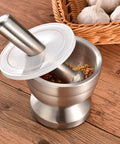 18 By 8 Stainless Steel Mortar And Pestle Set With Brushed Finish Durable Non Slip Base Rustproof No Residual Taste Easy To Clean Spice Grinder For Herbs And Pills Grinds Spices Like A Pro In Your Kitchen with lid, spices inside