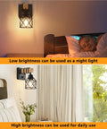 Badass Dimmable Wall Sconces Set Of Two With Rotary Switch And Black Metal Cage With Wooden Post featuring low and high brightness settings.