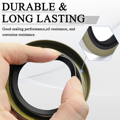 Trailer hub grease seal with garter spring; olive-green outer metal ring and black inner lip (front view)