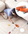 Kid playing with Totally Realistic Small Pickup Truck Model Miniature Figurine For Home Decor And Tabletop Display on carpet