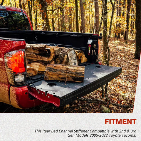 Badass Heavy Duty Tacoma Bed Channel Stiffener And Rear Support Bracket For 2005 To 2022 Toyota Pickup with logs in truck bed.