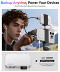 Man using MagSafe Magnetic External SSD With Built-In SD And TF Card Reader attached to phone with USB C cable