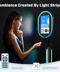 User operating Mirror Photo Booth With Printer And 4K HD Camera, RGB Surround Lighting, 16 Inch Touch Screen, Remote App Control.