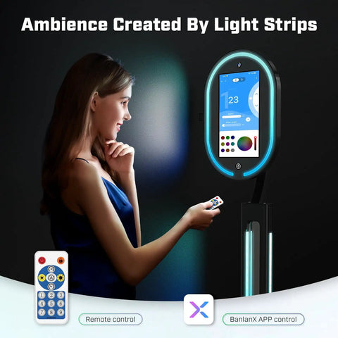 User operating Mirror Photo Booth With Printer And 4K HD Camera, RGB Surround Lighting, 16 Inch Touch Screen, Remote App Control.