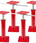 Four red steel adjustable floor jacks for crawlspace leveling with threaded posts and base plates (front view).