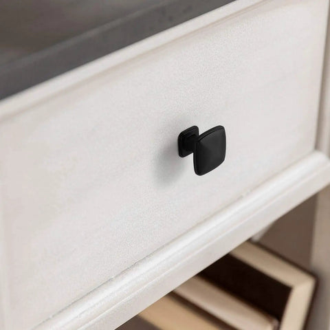 25 Pack Matte Black Cupboard Drawer Knobs For Kitchen Cabinets And Dressers Zinc Alloy Single Hole Cabinet Handles Easy Install Fingerprint Resistant Durable DIY Friendly Hardware shown on white cabinet.