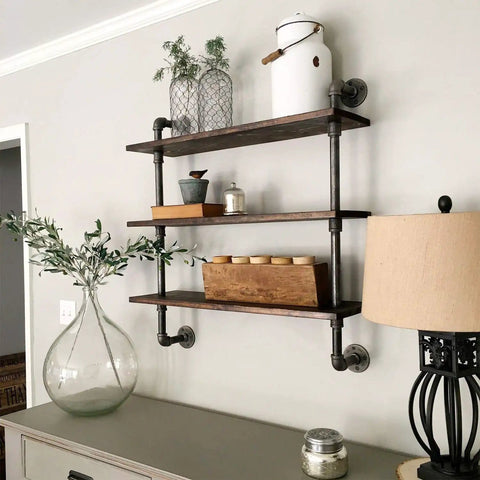 Industrial style shelving made with Three Quarters Inch Black Side Outlet Elbow Three Way Corner Pipe Fitting for DIY projects.