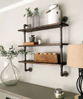 Rugged 3/4 Inch By 16 Inch Black Iron Pipe Nipple Set 10 Pack with Black Paint Finish used in industrial shelving decor