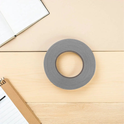 Double Sided Conductive Tape For Electrical Repairs And EMI Shielding, 5mm Wide Silver Conductive Fabric With Anti Interference, grey roll on desk