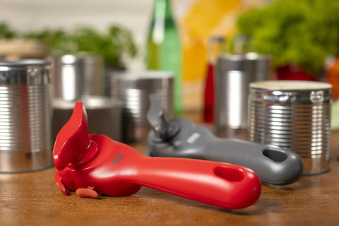 No-Touch Can Opener With Ring-Pull Tool And Auto Safety LidLifter Smooth-Edge Side-Cut Design For Safe Lid Removal Easy-Turn Handle Swiss Engineered Red, red opener on wood