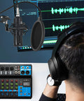 Person using headphones and microphone with 5 Channel Audio Mixer With Bluetooth USB MP3 Stereo 48V Phantom Power Pro DJ Mixing Console