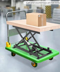 Heavy Duty 350lb Electric Scissor Lift Table With Adjustable Hydraulic Platform for Raising Heavy Loads with box on top.
