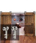 7 Foot Barn Door Hardware Sliding Track Kit in stainless steel with Y shape hangers installed on double wood doors.