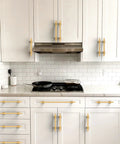 Champagne Bronze Cabinet Pulls 3 Inch 76mm 10 Pack Honey Bronze Kitchen Cupboard Handles installed on white cabinets