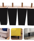 4 Pack Black Wood and Iron Furniture Legs Replacement for Cabinets and Benches, sleek minimalist style shown in use on sofas.