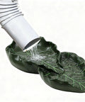 Dual Leaf Decorative Splash Block And Gutter Downspout Rain Diverter Extension For Lawn Patio Yard Garden Heavy Duty Weatherproof No Hassle Backyard Kickback To Shield Foundation Smooth Water Flow with water flowing from downspout.