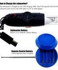 Super Cool RC Submarine Toy For Surface And Deep Water Diving, showing USB charging cable and battery compartments.